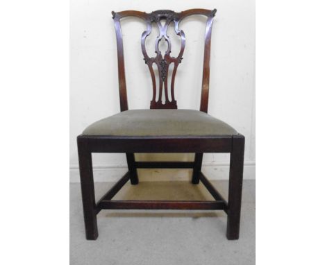 A mid 19thC Chippendale style mahogany framed dining chair, having a serpentine outlined crest and a pierced, foliate carved 