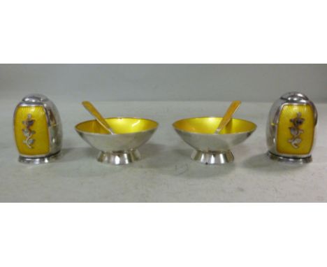 A 1960/70s Danish four piece, silver coloured metal condiments set with engine turned yellow enamelled decoration  comprising