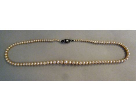 A graduated cultured pearl necklace, on a Sterling silver clasp