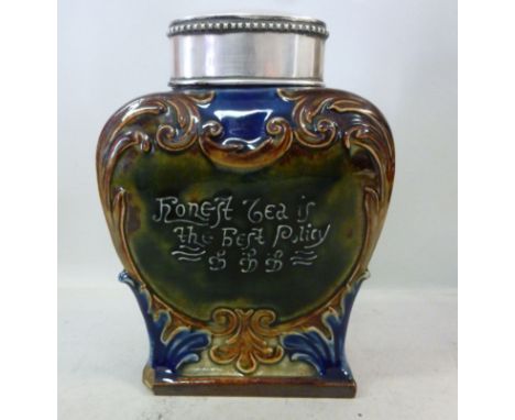 A late Victorian Royal Doulton stoneware tea caddy of shouldered box design, inscribed 'Honest Tea Is The Best Policy' on a m