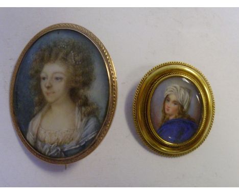 An early 19thC yellow metal, oval framed brooch, set with a head and shoulders portrait miniature, a woman wearing a blue dre