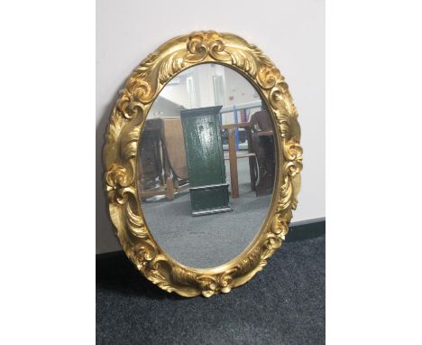 An ornate gilt framed mirror 