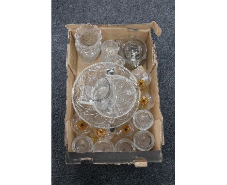 A box of assorted drinking glasses, lead crystal water jug, glass ware and a battery operated carriage clock 