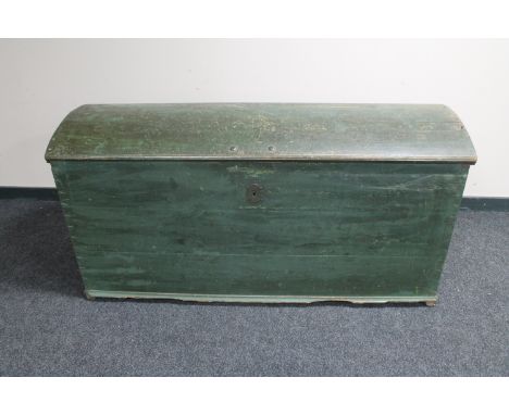 A 19th century hand painted domed topped shipping trunk with cast iron carry handles (locked)