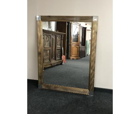 A contemporary overmantel mirror 110 cm x 140 cm
