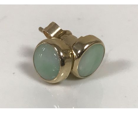 A pair of 9ct gold jade earrings CONDITION REPORT: 1.1g