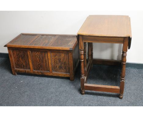 An oak blanket box and a gate leg table  CONDITION REPORT: The blanket box is 92cm wide by 46cm high by 46cm deep. 