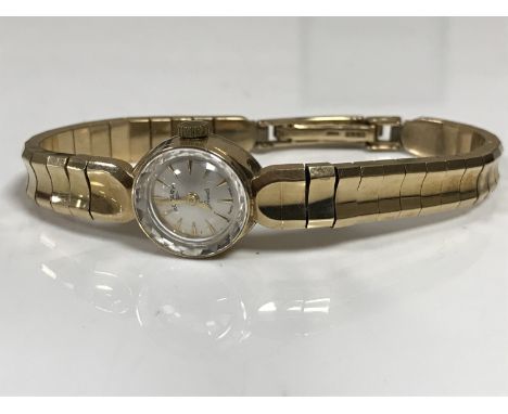 A lady's 9ct gold Rotary wristwatch on 9ct gold bracelet strap CONDITION REPORT: 20.2g gross. 