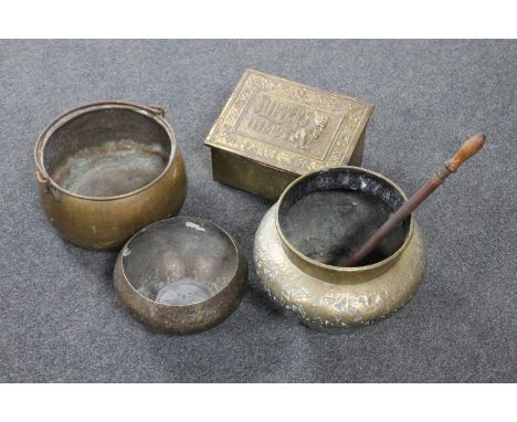 A brass embossed slipper box, brass planter, vintage rose sprayer and a brass swing handled cauldron 
