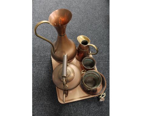 A tray of antique and later copper ware including kettle, jug, lion mask handled planter etc 