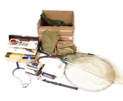 An Okuma Coronado CD 30 fishing reel, further reel, lures, nets and fishing apparel. (a quantity)