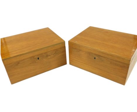 A pair of light oak boxes, originally for fishing flies, the hinged lid opening to reveal a double tray insert, with keys, 16