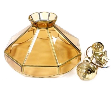An octagonal brass and glass ceiling light, each framed section set with bevelled glass, 42cm wide.