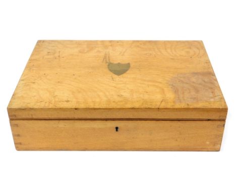 An early 20thC Goldsmiths &amp; Silversmiths Company Ltd light oak canteen box, the hinged lid with brass shield escutcheon o