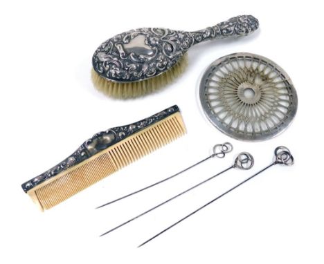 A group of small silver, to include three hat pins, a Victorian silver mounted hairbrush and comb, with embossed decoration, 