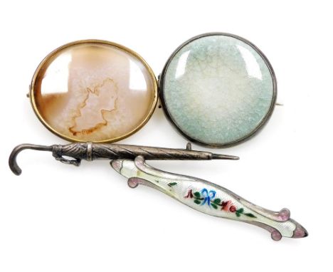 A Kensington Artware circular pottery brooch, in a white metal mount, an agate brooch in a yellow metal mount, silver pin bro