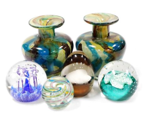 A pair of Mdina glass vases, with mottled green, brown and blue decoration, etched mark, 12.5cm high, together with a Caithne