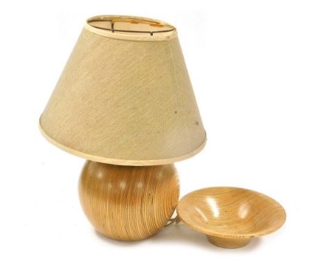 A late 20thC Continental banded wooden table lamp, of globular form, with an oatmeal coloured shade, 47cm high, together with