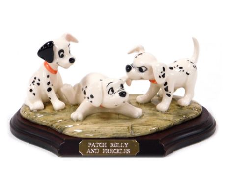 A Royal Doulton Disney's 101 Dalmatians figure group, modelled as Patch, Rolly and Freckles, limited edition 2201/3500, DN5, 
