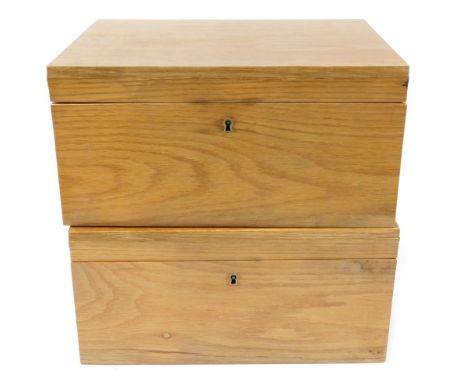 A pair of light oak boxes, originally for fishing flies, the hinged lid opening to reveal a double tray insert, with keys, 16