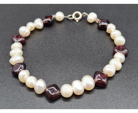 A Natural Pearl and Agate Bracelet. 7cm diameter. 