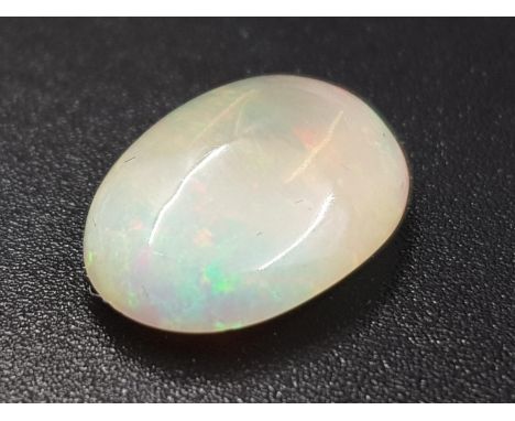 A 2.85ct Natural White Fire Opal in the Oval Cabochone shape. Come with GLI Certificate 