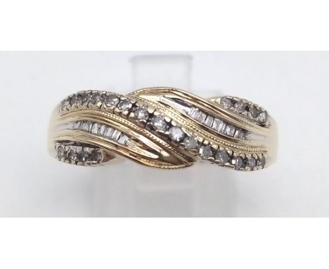 A 14 k yellow gold with diamonds (0.25 carats) on a twisted design. Ring size: P1/2. weight: 3 g. 