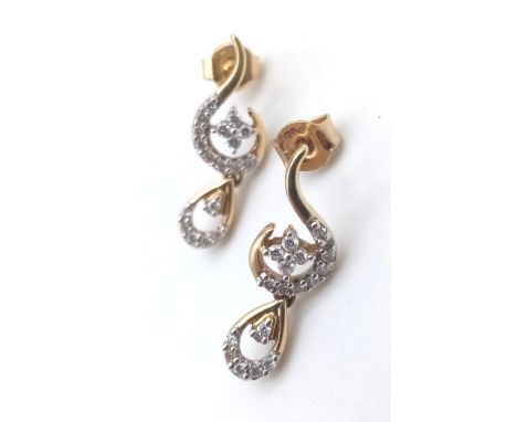 An 18 K yellow gold swirl drop earrings with diamonds. Total weight: 3.5 g. 