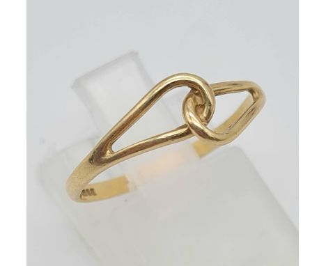 A 9K Yellow Gold Eternity Knot Ring. Size M. 0.96g 