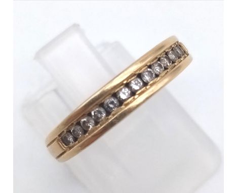 An 18 K yellow gold half eternity ring with diamonds (0.3 carats). Ring size: L, weight: 2.6 g. 