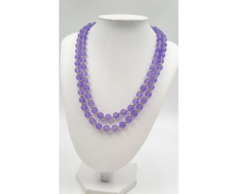A Lavender Jade Two-Row Bead Necklace. 44cm 