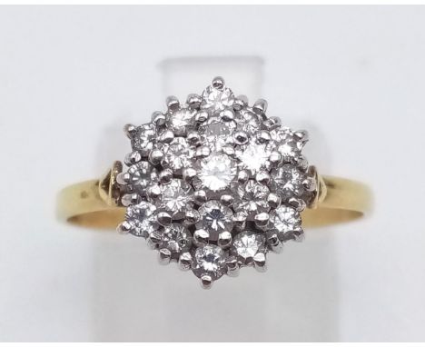 An 18 K yellow gold ring with a diamond cluster ( 0.35 carats), Ring size: P, weight: 2.6 g. 