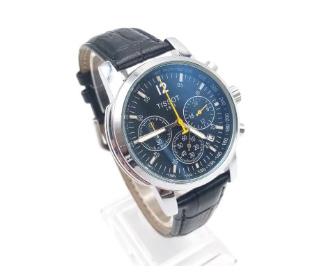 A Tissot Gents Watch. Leather strap. Blue dial. Case - 40mm. Quartz movement - new battery. 