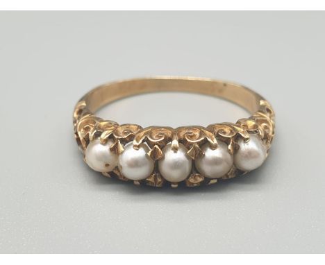 A 16K Yellow Gold 5 Seed Pearl Ring. Size R. 3.78g 