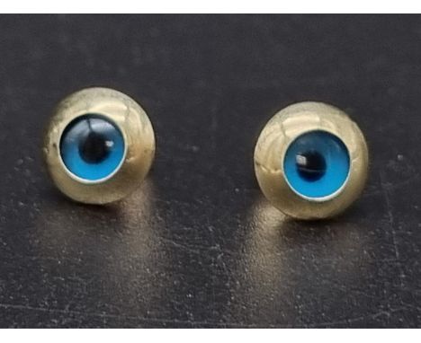 A 9 K  yellow gold Evil Eye pair of earrings. weight: 1.5 g. 