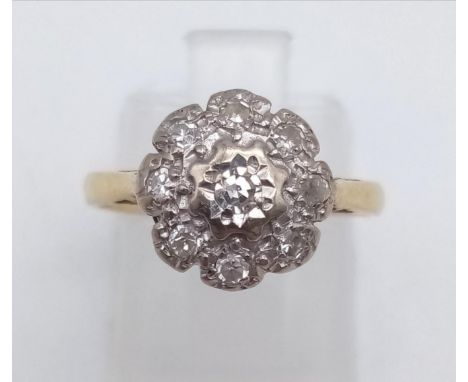 A 14 K yellow gold ring with a diamond cluster (0.2 carats). Ring size: L, weight: 2.67 grams. 