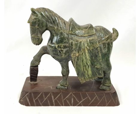 A Wonderful Chinese Antique Hand-Carved Green Jade War Horse Sculpture. Possibly Tang Dynasty Era. Stands on a wooden plinth.