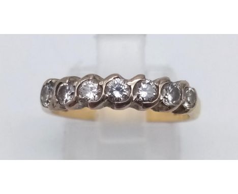 An 18 k yellow gold ring with seven diamonds (0.45 carats). ring size: M, weight: 3.3 g. 