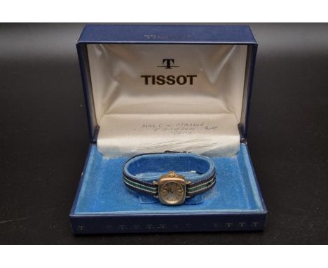 A Vintage Tissot Saphir Ladies Watch. Original cloth strap. Two tone case - 20 x 17mm. Quartz movement in working order. Come