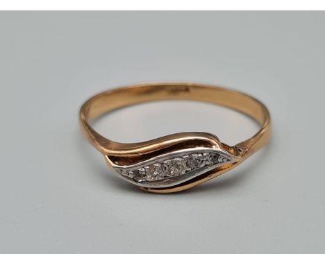 An 18K Yellow Gold and Diamond Ring. Leaf-shaped centre with small diamonds. Size N. 1.84g 