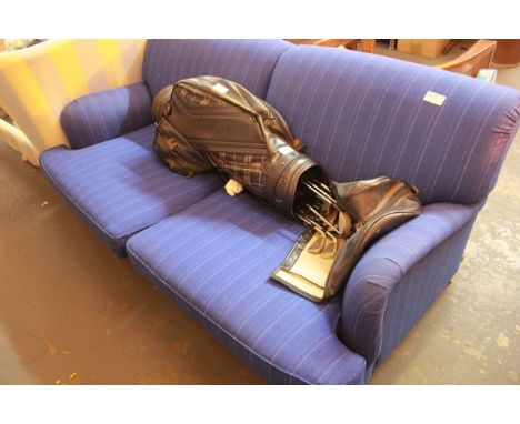 BLUE FABRIC TWO SEATER SOFA WITH PIN STRIPE DESIGN ON CASTERS / GRADE: UNCLAIMED PROPERTY (DC7)