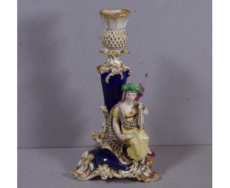 Early Derby type candlestick. figure of a muse applied to base. Column of blue ground with thistle shaped, gilded candle hold
