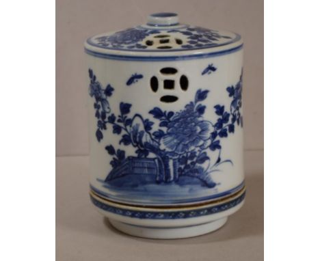 Chinese blue and white ceramic candle lantern with butterfly and floral decoration and piercing to the lid, H15 cm approx