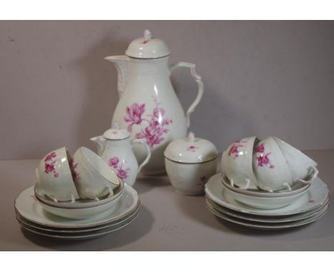 K.P.M German pink floral sprig part coffee set comprising of a coffee pot, lidded sugar, lidded creamer, 5 cups, 4 saucers, a
