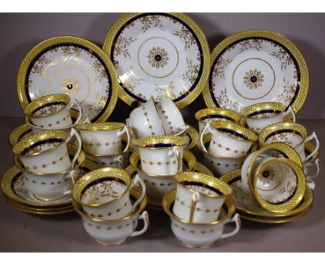 Early 19th C English part tea & coffee service decorated with a band of pale yellow, comprising 11 each coffee cups, tea cups