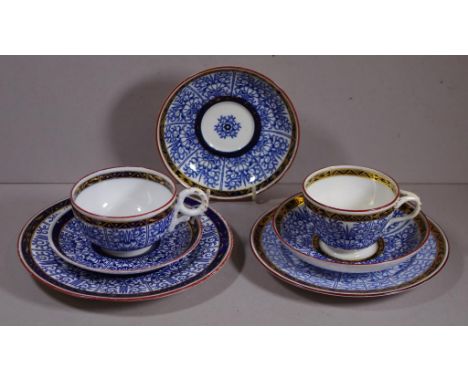 Two Royal Worcester bone china Lily pattern trios together with an additional saucer.