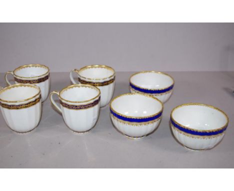 Four Derby coffee cups circa 1790 puce Derby mark, together with 3 Derby tea bowls