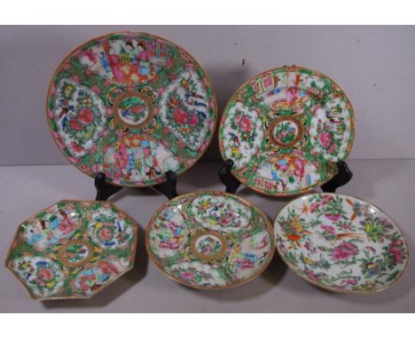 Two Chinese Famille Rose side plates together with three saucers