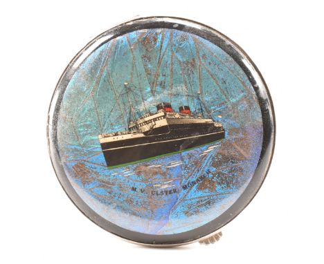 A vintage butterfly wing set compact mirror. The compact of round form in white silver tone metal depicting the M. V. Ulster 