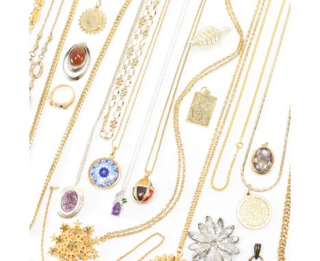 A large collection of costume jewellery necklaces to include. Gold plated, gold tone, silver tone pendant necklaces. Some bei